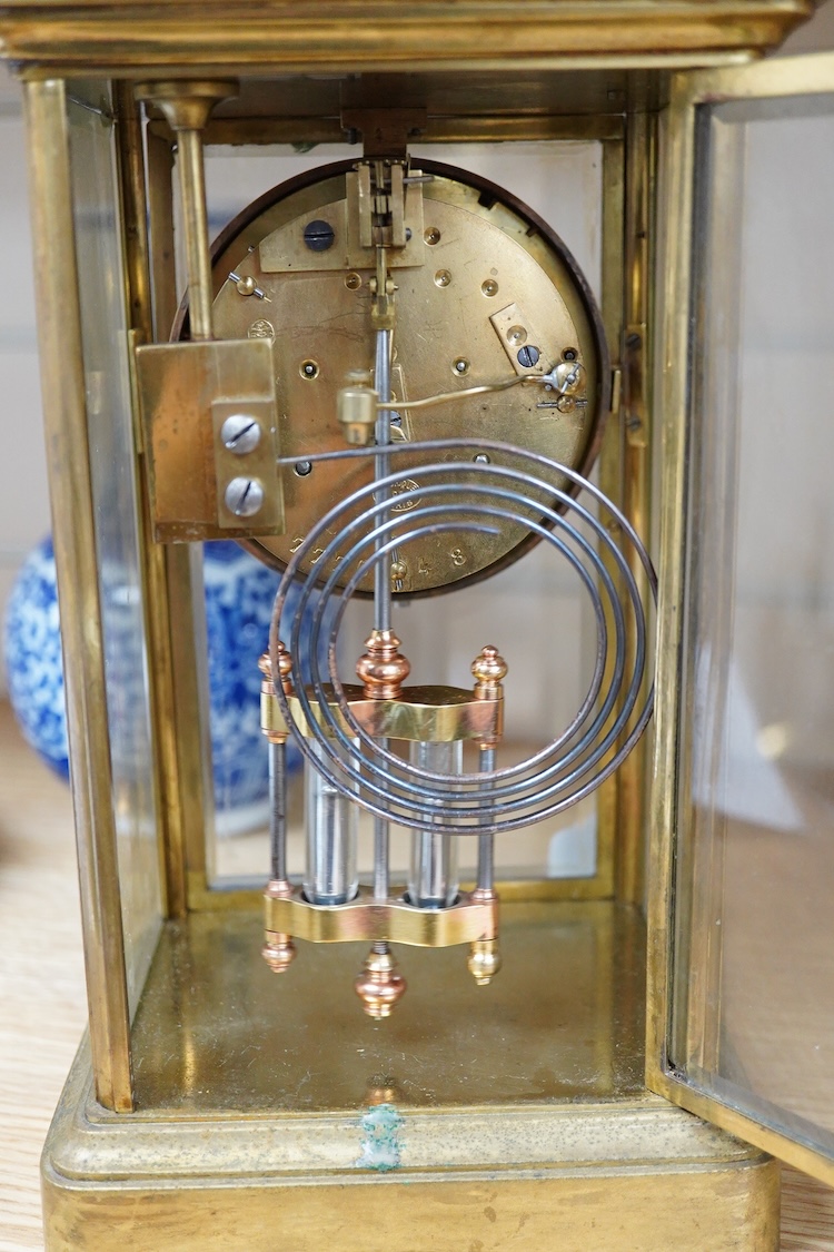 A late 19th century French brass four glass mantel clock, 25.5cm high
